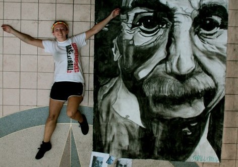 Shallcross compares the size of her mural of Einstein to her body.
By: Wesley Myers 
