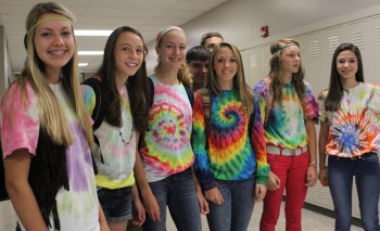 Students roam the hallway before homeroom in there hippie/ tie-die attire, in support of spirit week. 