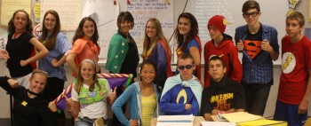 Photo by: Eli Holloway
Math teacher Maureen Honeychuck celebrates Super Hero day with one of her classes.