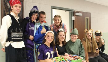 Sophomore class council dresses up and enjoys the evening while handing out candy during October Fun Night. 