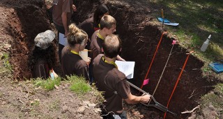 At one point in the competition students investigated soil layers in the ground.  Picture from EnvirothonPA.