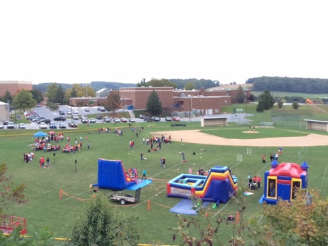 The bounce houses and velcro walls were big hits during the tailgate. Photo by Daniel Stiffler.