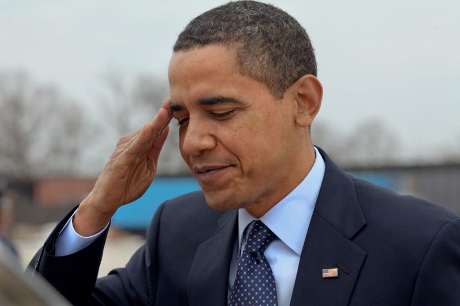 Obama Salutes his people. Photo credit to Pete Souza [Public domain], via Wikimedia Commons 