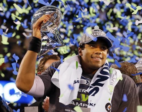 Russel Wilson after his first Super Bowl win against the Denver Broncos. Photo by Getty Images