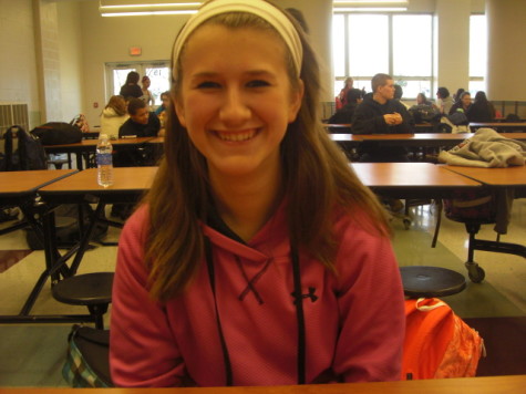 Sophmore Beth Ayers wears pink and white to participate in spirit day.