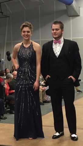 Junior Rachel Banchiere and senior Jake Machulcz model prom attire on the runway.  Photo By: Donna Burns