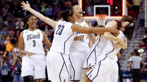 Huskies Celebrate Victory after buzzer sounds. Photo by By Sphilbrick (Own work) 