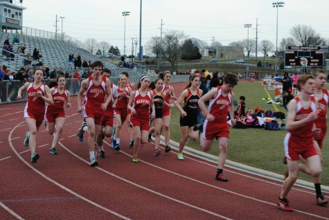 Both the girls and boys teams run in a distance competition.