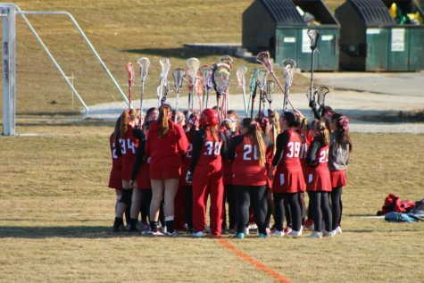Lady Warriors Raise Sticks For Victory! Photo By Kerrie Defelice
