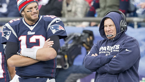 Tom Brady (left) and Bill Belichick (Right) share a chat. Photo by Getty Images
