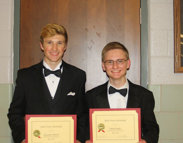 Ethan Paules and Alex Rebich pose for a picture with their Yeater scholarship. Photo credit of Karen Paules.
