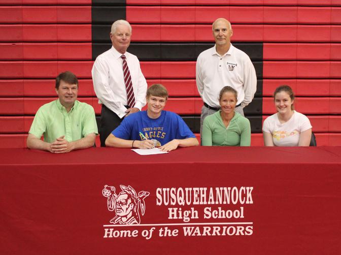 (Featured in the photo are Caleb Bryant, front row, with his parents, Darrell and Judy Bryant, along with his sister, Chelsey Bryant, right; also pictured, back row, Varsity Golf Coach Ray Lingenfelter, left and Athletic Director Chuck Abbott, right.)