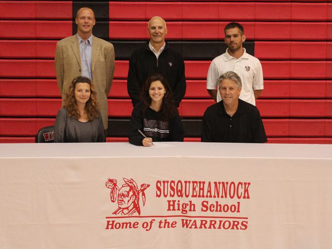 (Featured in the photo are Melissa Lynch, front row, with her parents, Mary Ellen and Steve Lynch; Also pictured, back row, Varsity Girls’ Soccer Coach Pat Brubaker, left, Athletic Director Chuck Abbott, center, and Varsity Boys’ Soccer Coach Brett Maxwell, right)