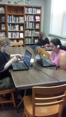 Students study and complete projects at the local library. Photo By: Ariel Barbera