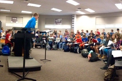 The choir practices for their forthcoming concert.