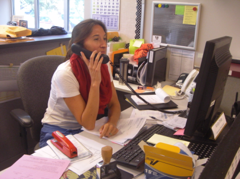 Mrs. Ehlke answering the phone in the office. Photo by Ally Kerr.