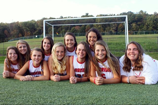 The+senior+field+hockey+players+pose+for+their+senior+pictures.+Photo+by+Addy+Schefter.