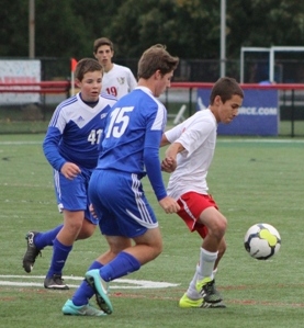 Midfielder and freshman Anthony Maiorano defends the ball from Kennard-Dale opponents.