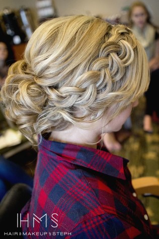 The low braided messy bun is a great option if your dress has a pretty back. Photo by: http://blog.hairandmakeupbysteph.com/2014/10/two-day-atlanta-workshop.html