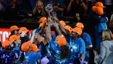 The Minnesota Lynx celebrate their 2015 WNBA Championship photo by: John Autey