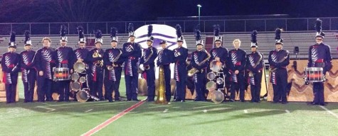 The marching band poses at their competition on November 15.