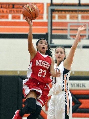 Freshman Jayla Galbreath drives in for the lay-up. Photo by; John A. Pavoncello - The York Dispatch