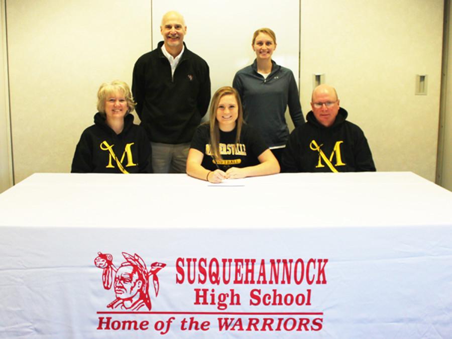 Featured in the photo are, Allyson Kerr, front row center, along with her parents, Tracey and Bill Kerr; in the back row are Athletic Director Chuck Abbott, left, and tournament coach, Brianna Smith, right.