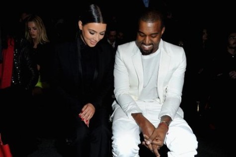 Kim and Kanye showing their happiness for their new baby.