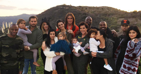 Scott Disick is at the Kardashian's Thanksgiving dinner holding his son, Mason.
