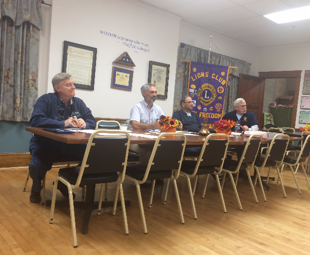 The officers of the Lions Club discussing project topics. Photo by Ally Kerr.