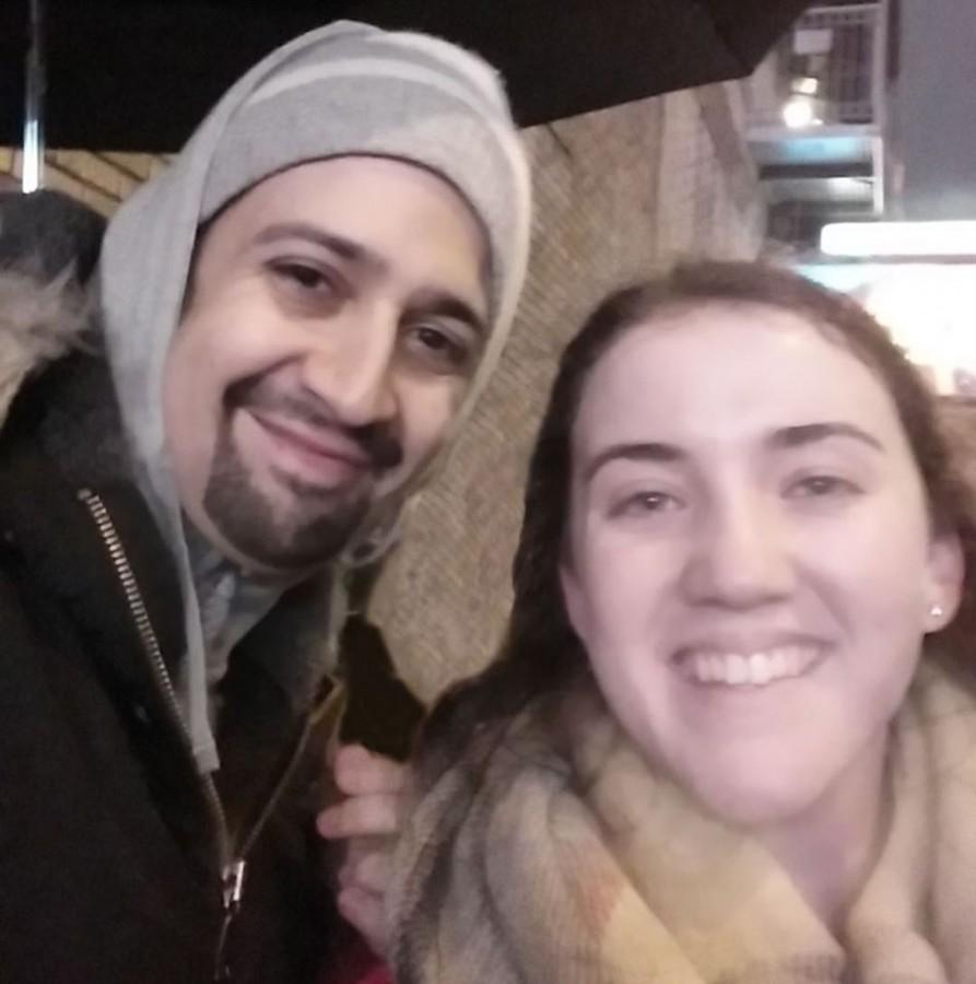 Actor and composer Lin-Manuel Miranda  smiles for a photo with senior Brigit Duffy.