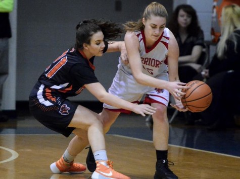 Anna Mahan trying to grab the ball. Photo By; York Dispatch 