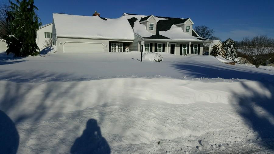 Many streets and driveways were filled with over three feet of snow.  Photo by: Nathan Sergent