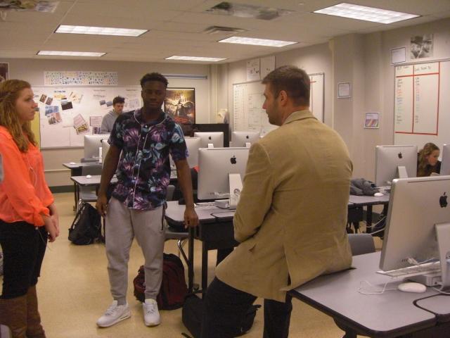 Hare helps his video productions students by providing filming tips.