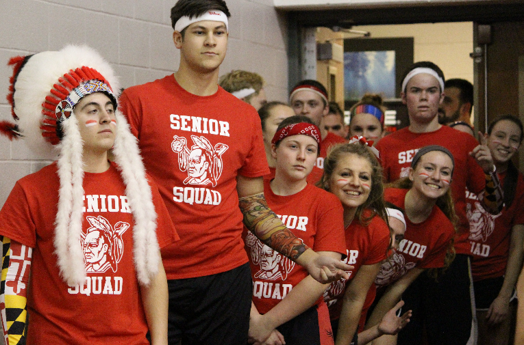 The high school team of students gets ready to take the court. 
Photo By: Karah Sweitzer
