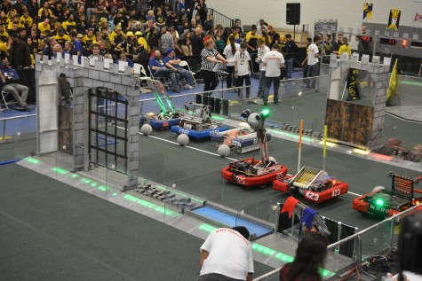 The team's robot rests on the field, waiting for the match to start. Photo courtesy TechFire 225.