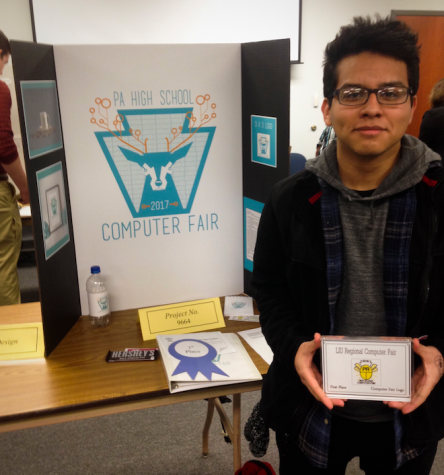 Gallegos is awarded first place in the logo design category