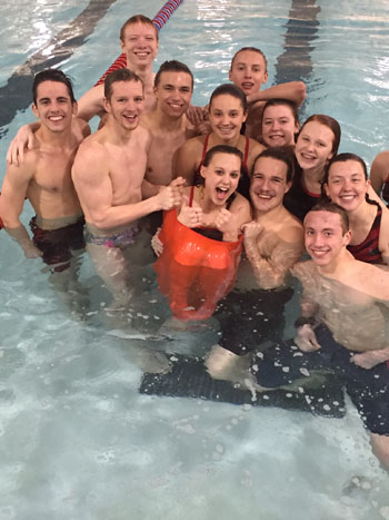 Swimmers pose for a picture at districts.