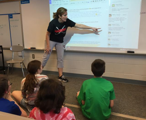 DeLuca demonstrates the "comment" feature for her students. Photo by Karly Matthews.