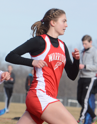 Senior Rachel Banchiere is excited to run into her last track season. Photo by Mike Inkrote.