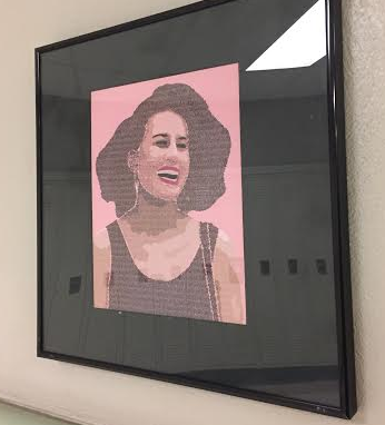 Smith's portrait of Ilana Wexler hangs by the library. Photo by Karly Matthews.
