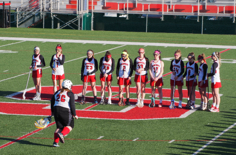 The team lines up before the game. Photo by Lisa Miller.