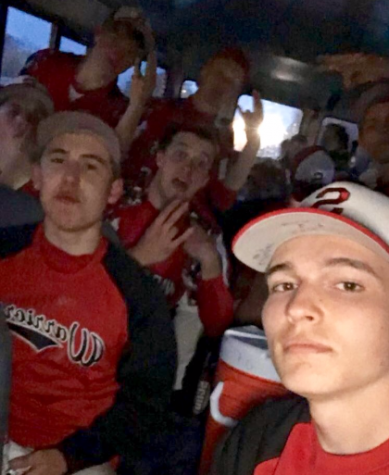 The baseball team selfies on a bus ride home after a team win. Photo by Logan Mohar.