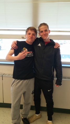 Junior Aaron Bilbie poses with his twin brother Seth Bilbie. Photo by: Ariel Barbera