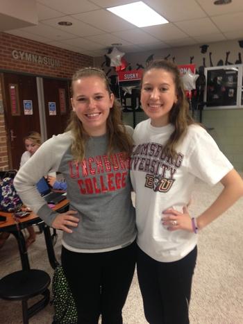 Seniors Maggie Kaliszak and Regan Lawlor pose together to show off their college attire. 
