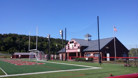 The football team practices on the Robert E. Lau Memorial Stadium. Photo by: Ariel Barbera