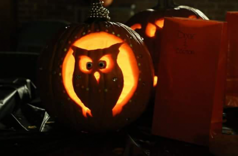 Some people get creative with their pumpkin carving designs, such as this owl design.