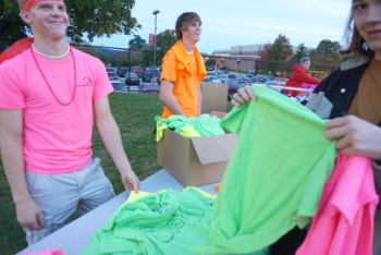 These neon shirts  were given out for neon night. 