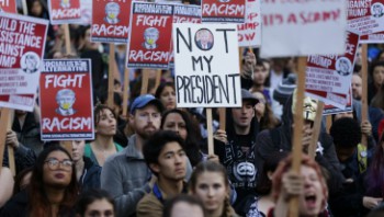 Protesters believe that Trump will make racism worse in America. Photo From @JuddLegum