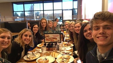 The staff poses for a selfie while bonding at IHOP. Photo Courtesy: Chase Summers